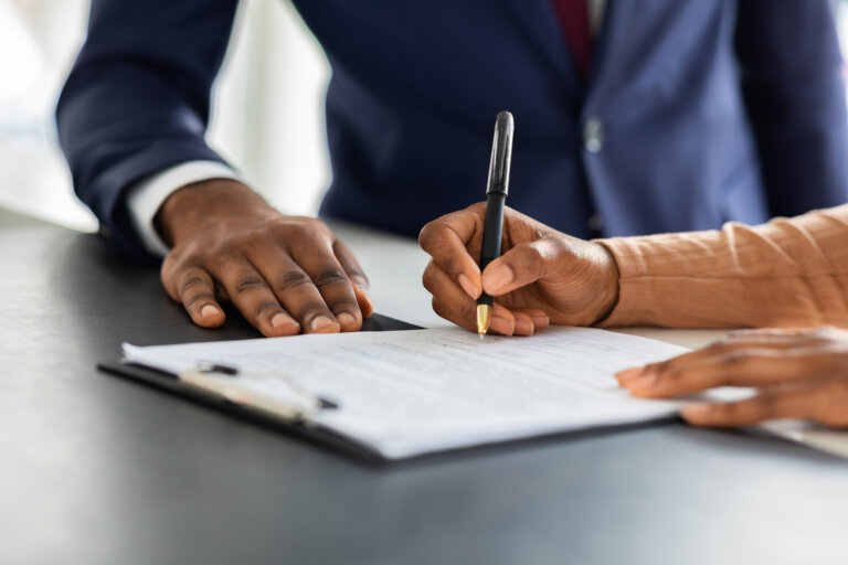 woman signing contract