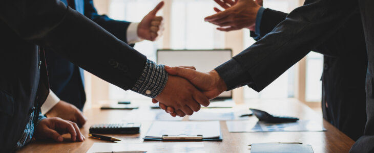 Handshake. Meeting of business people and working cooperation in the organization.