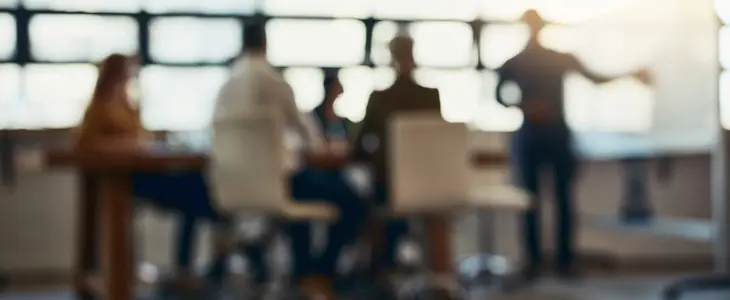 Shareholders discussing a business strategy in a meeting room